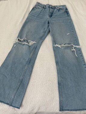 zara jeans  size 4  details: -high rise  -ripped knees  -no flaws